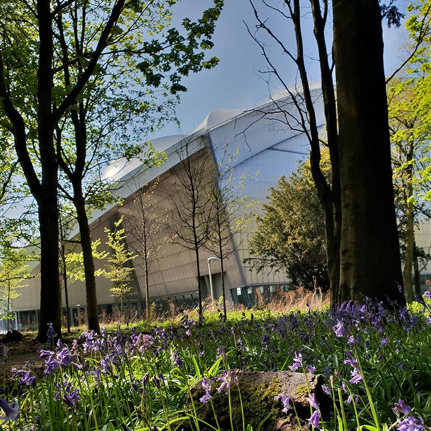 Image of Heriot-Watt University in the surrounding parkland.
