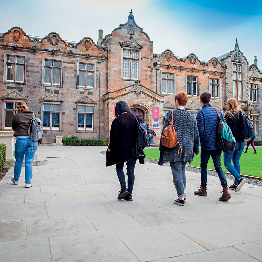 Image of students walking through St Andrews University's historic campus