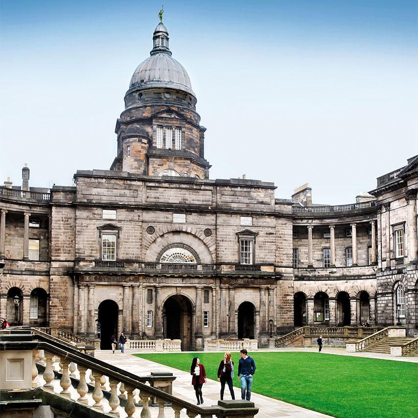 Image of students walking in Edinburgh University's Old College quad.
